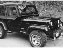 Black Extendafender Style Smooth Finish 4-Piece Fender Flare Set For 1987-1995 Jeep Wrangler (Excludes Renegade) Bushwacker